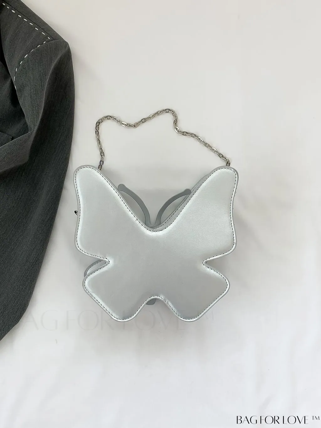 BagForLove - Chic Rivet Design PU Asymmetrical Bag with Butterfly Decoration