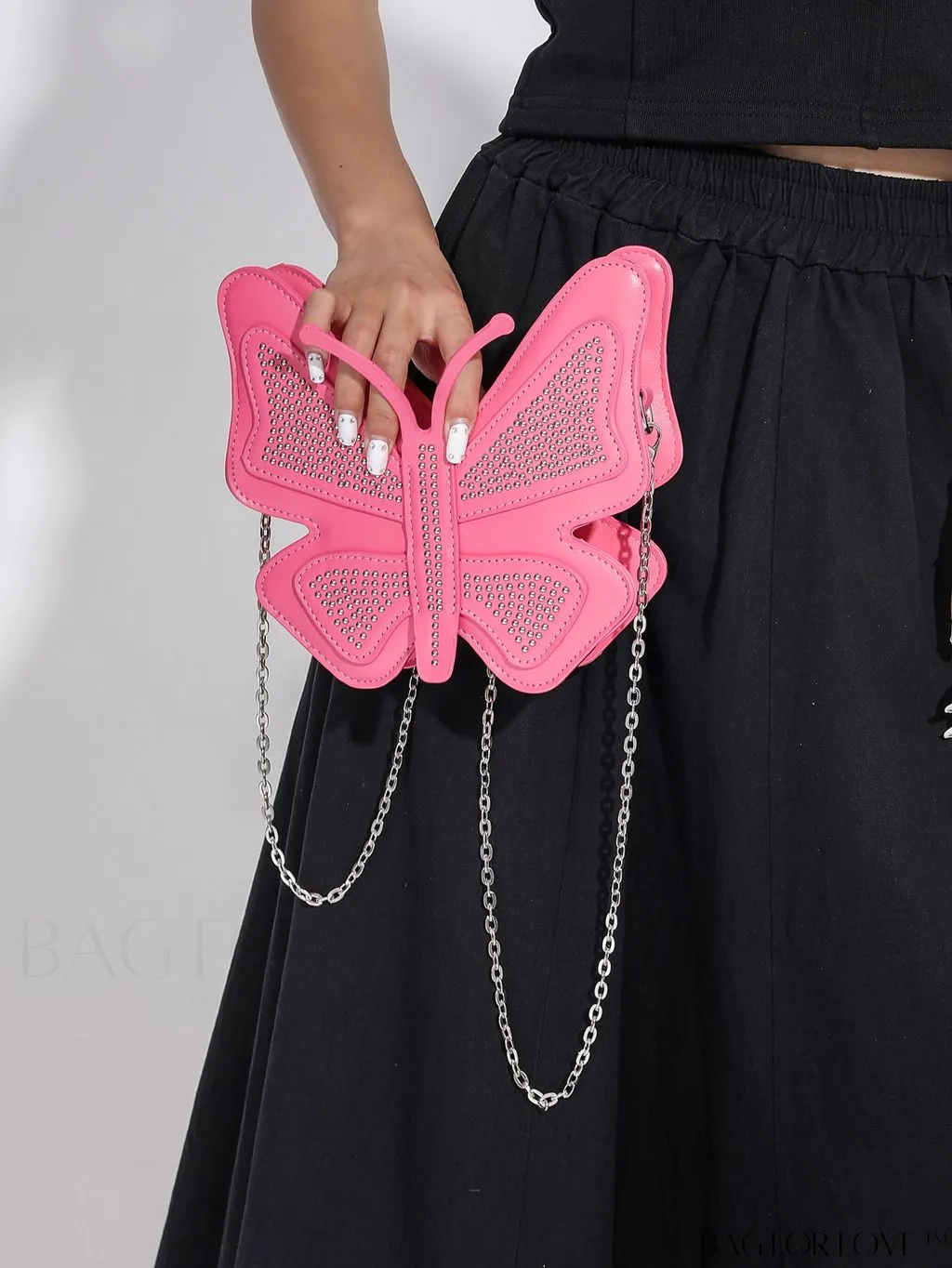 BagForLove - Rivet-Decorated Mini Butterfly PU Bag: Chic and Compact.