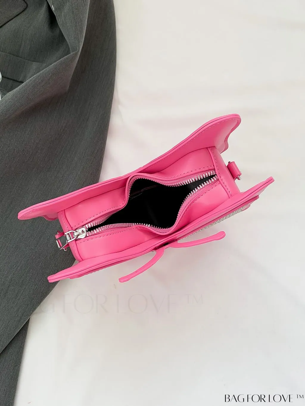 BagForLove - Rivet-Decorated Mini Butterfly PU Bag: Chic and Compact.