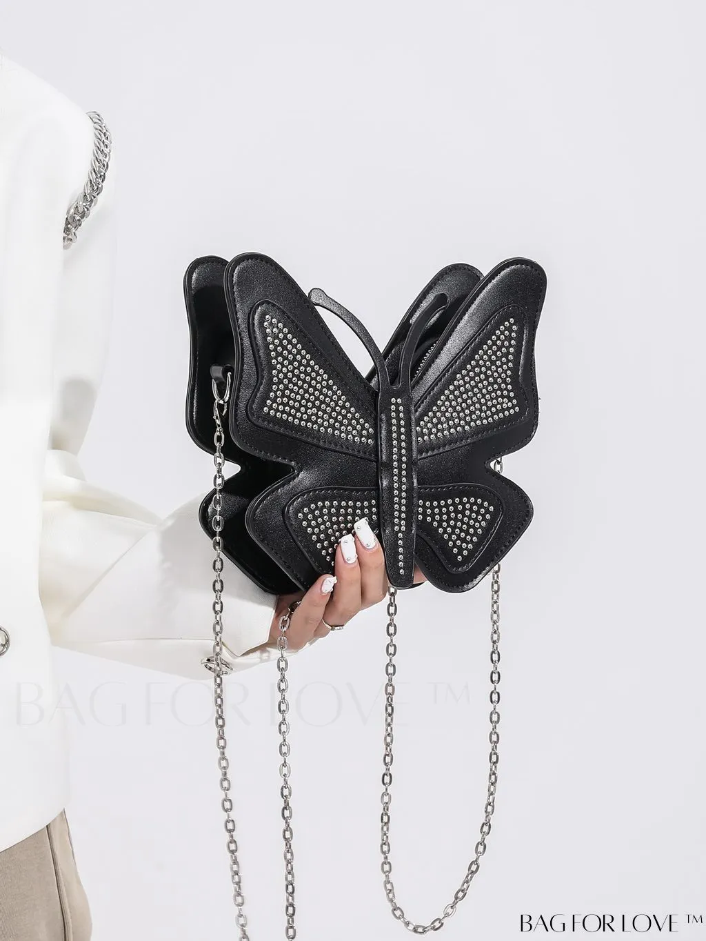 BagForLove - Rivet-Decorated Mini Butterfly PU Bag: Chic and Compact.