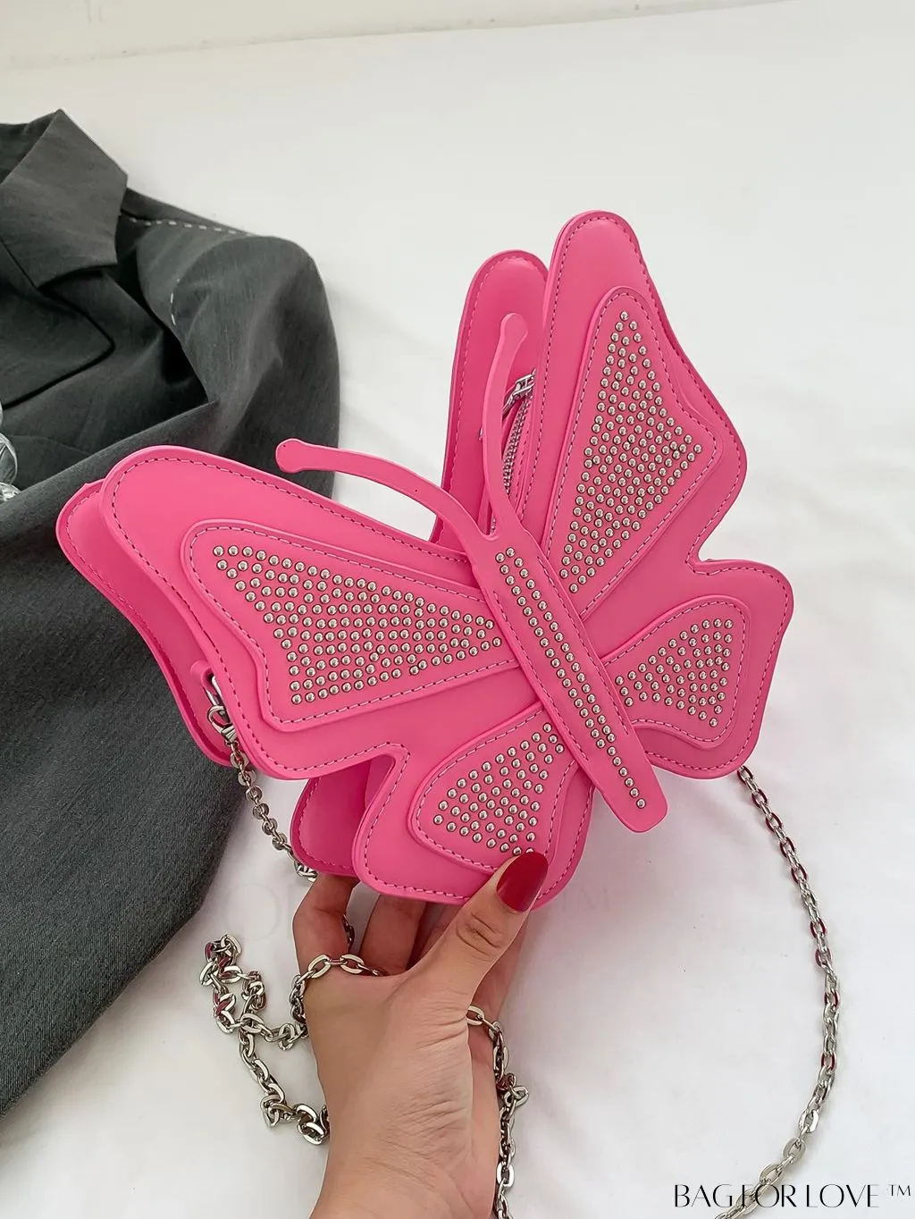 BagForLove - Rivet-Decorated Mini Butterfly PU Bag: Chic and Compact.