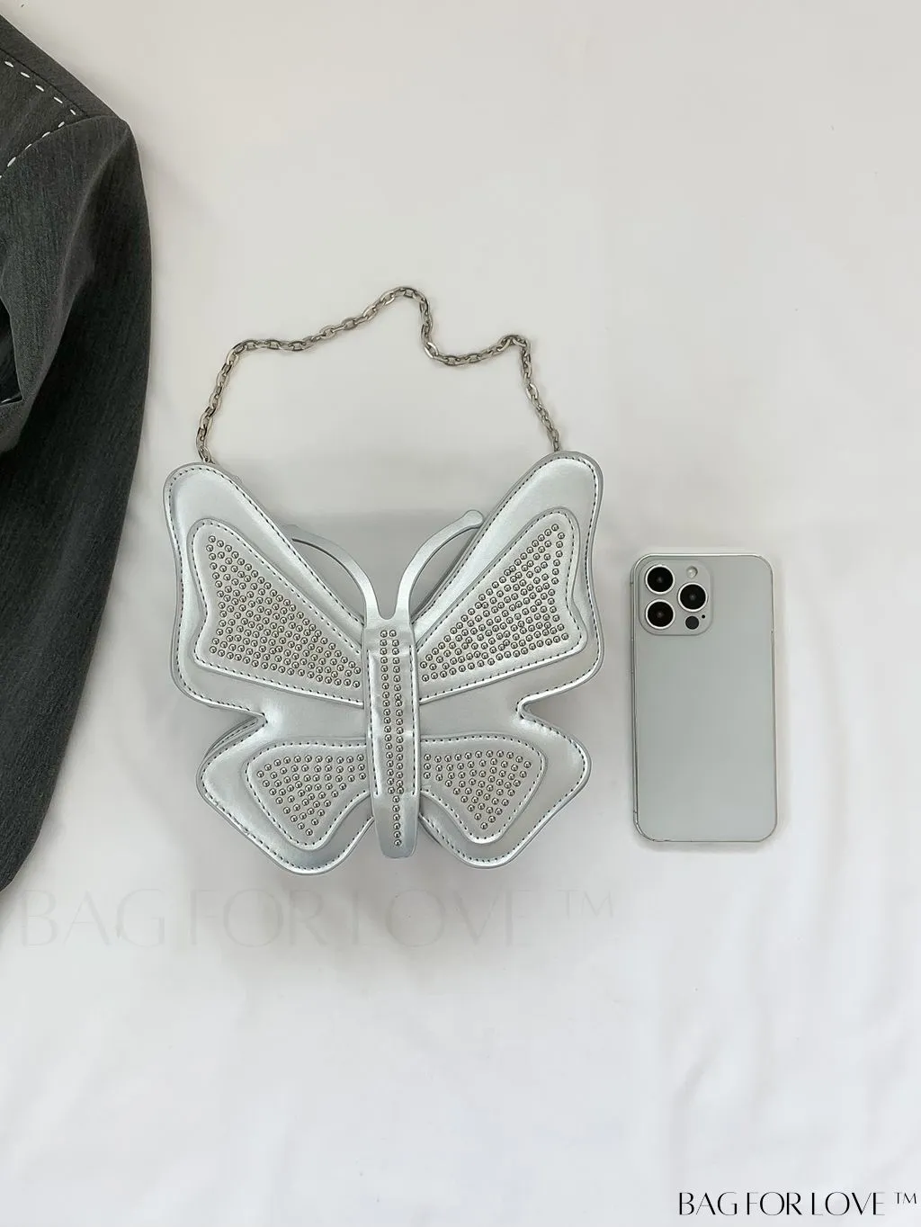 BagForLove - Rivet-Decorated Mini Butterfly PU Bag: Chic and Compact.