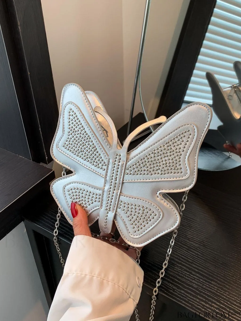 BagForLove - Rivet-Decorated Mini Butterfly PU Bag: Chic and Compact.