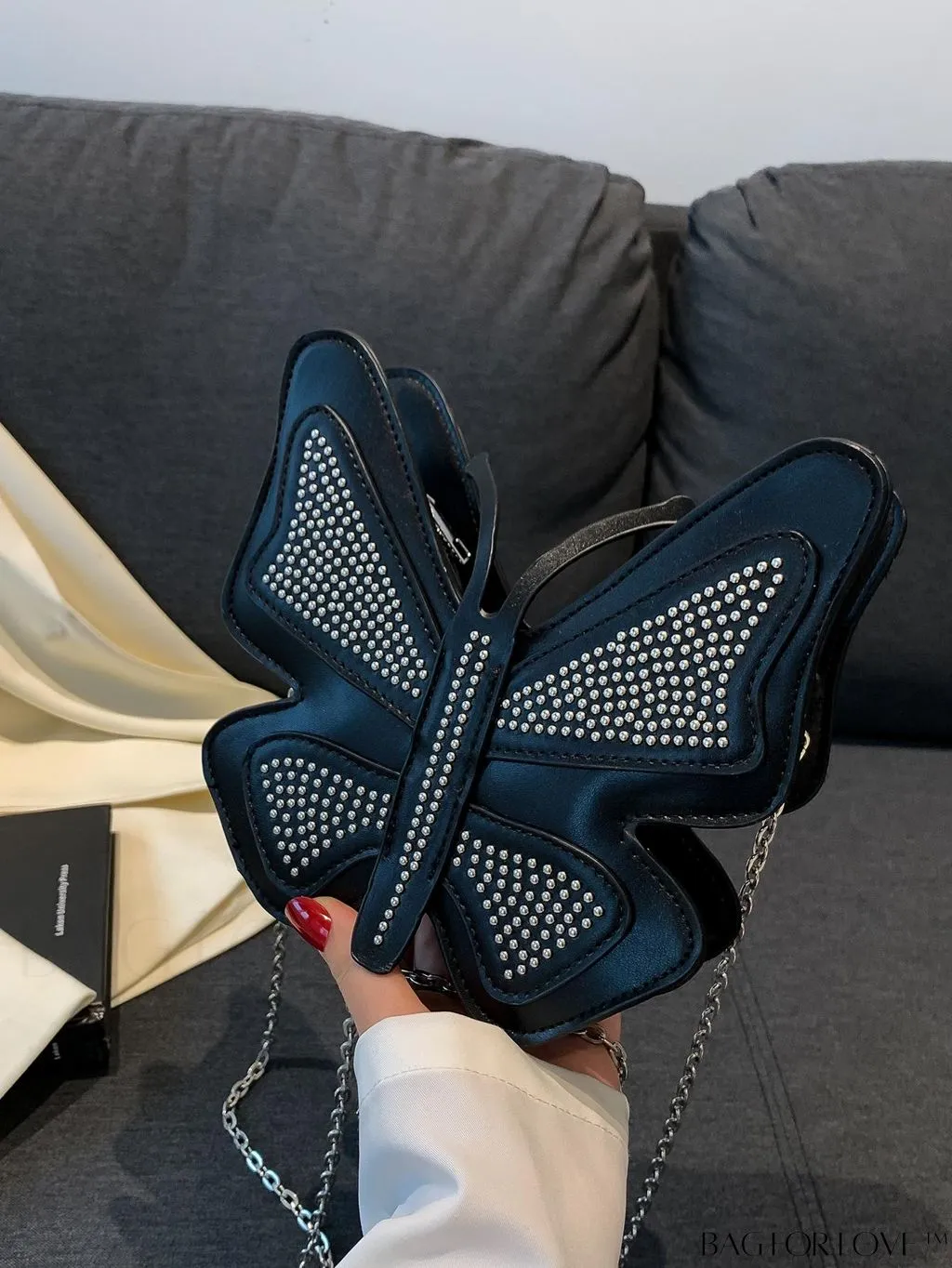 BagForLove - Rivet-Decorated Mini Butterfly PU Bag: Chic and Compact.