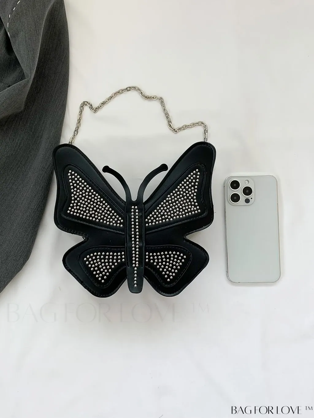 BagForLove - Rivet-Decorated Mini Butterfly PU Bag: Chic and Compact.