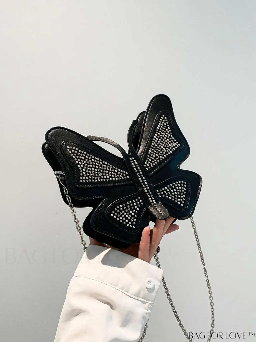 BagForLove - Rivet-Decorated Mini Butterfly PU Bag: Chic and Compact.