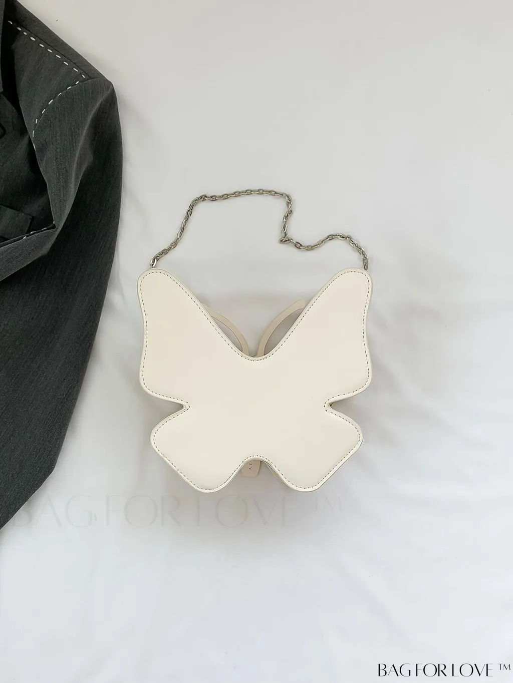 BagForLove - Rivet-Embellished Butterfly PU Handbag: Elegant and Chic