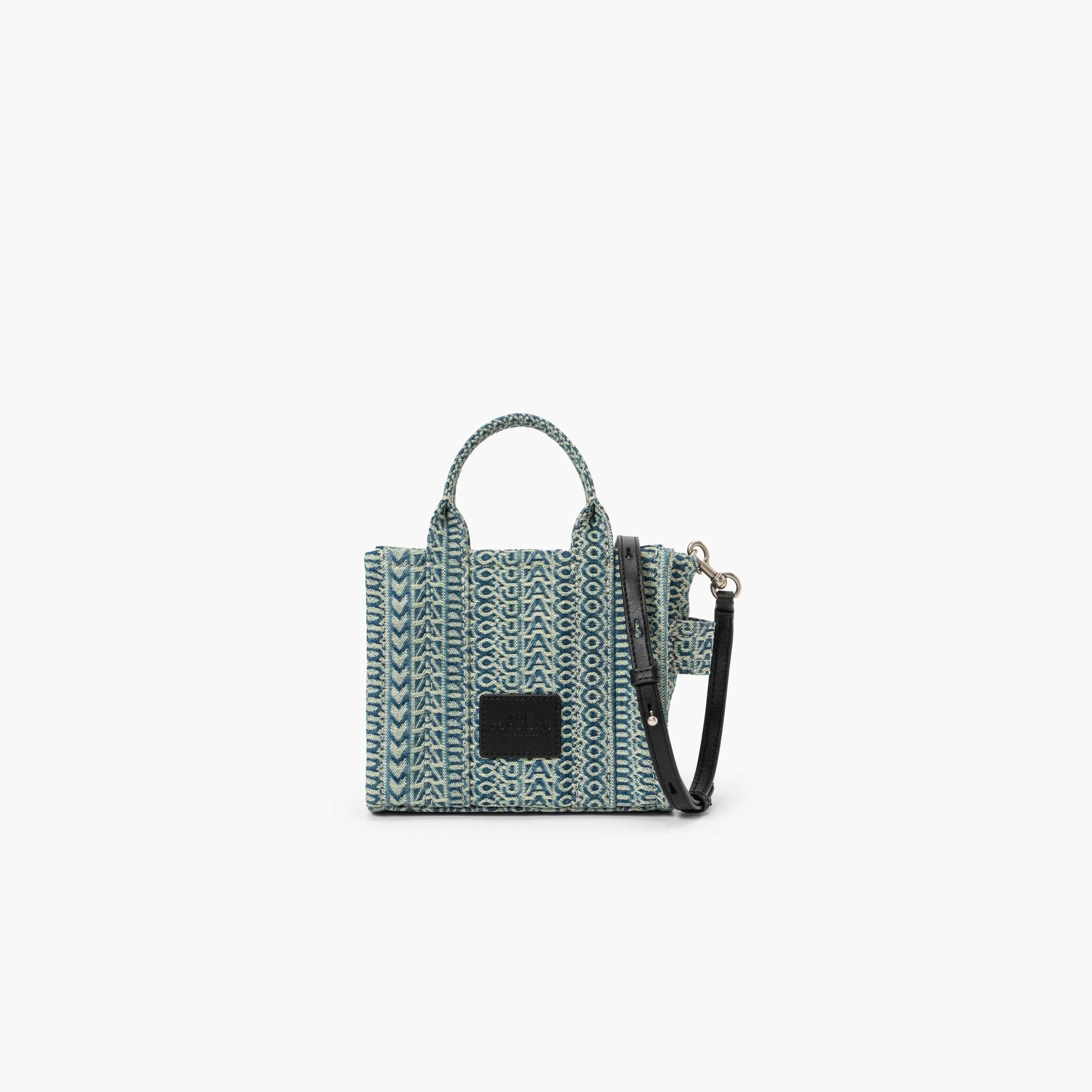 The Washed Monogram Denim Crossbody Tote Bag in Sun Faded Denim